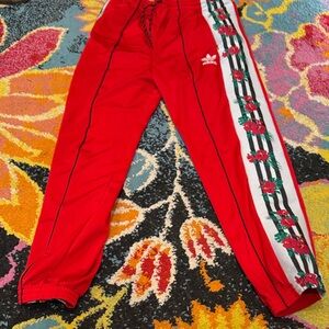 Adidas Women's Red Joggers with Floral Stripe